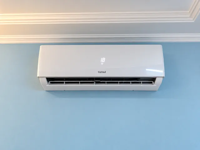 Ar-condicionado split Consul instalado em parede azul, com sanca de gesso no teto